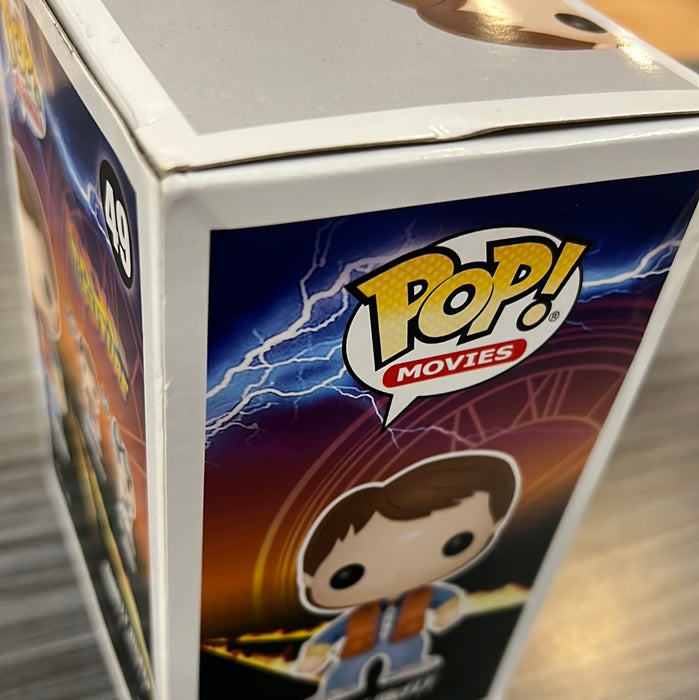 Funko POP! Movies: Back To The Future - Marty McFly (Plastic Empire 3000 PCS)(Plutonium GiTD)(Damaged Box)[A] #49